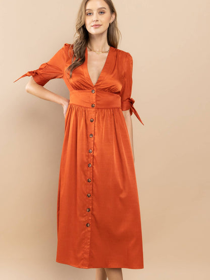 Vestido midi con botones delanteros y mangas con lazo
